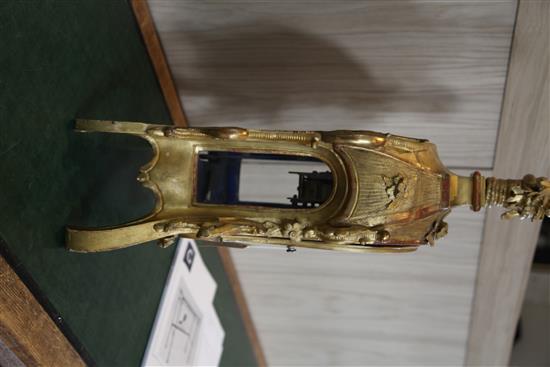 A mid 18th century German carved giltwood striking and chiming mantel clock, 26in.